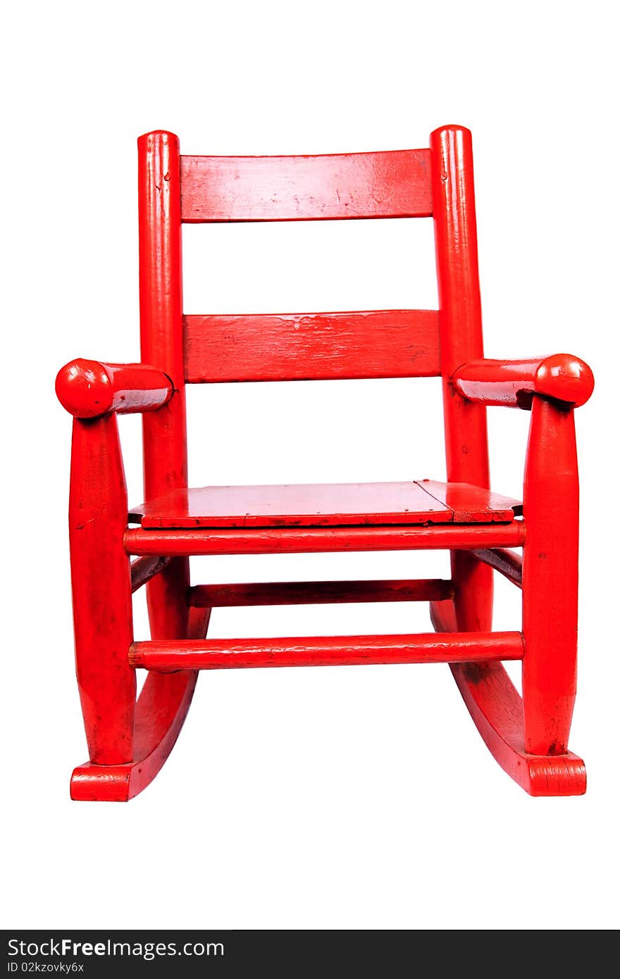 An antique rocking chair for a child