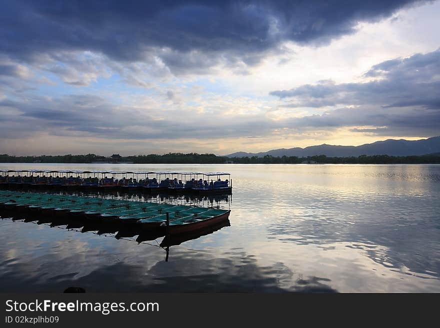 Boats on the Kunming Lake at dusk, Beijing