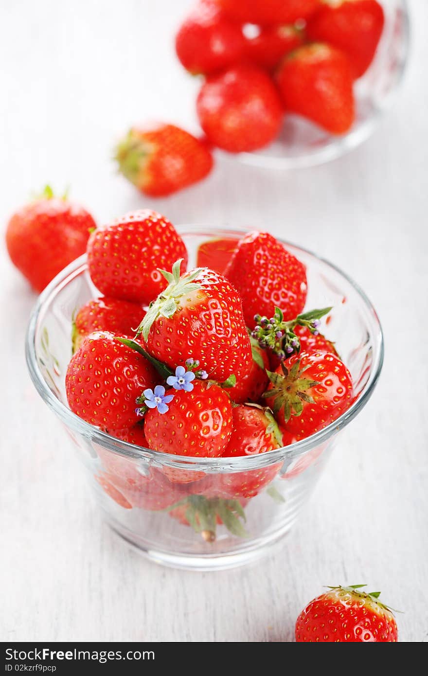 Fresh strawberries closeup on white background