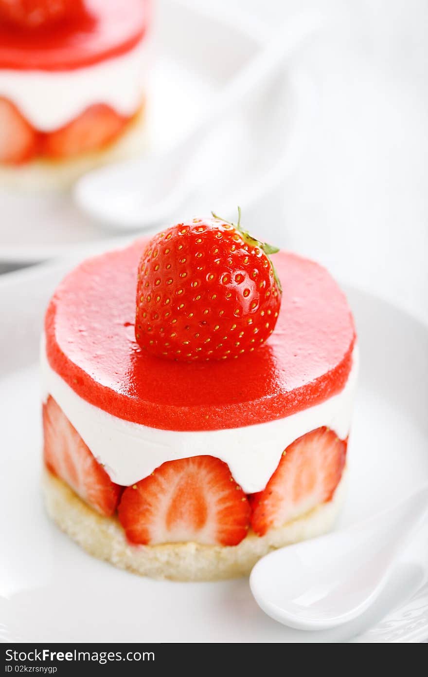 Dessert -cake with strawberries on a white background. Dessert -cake with strawberries on a white background