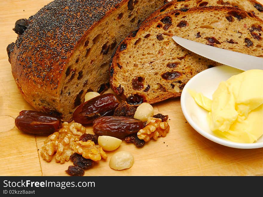 Fresh raisin toast with butter and knife