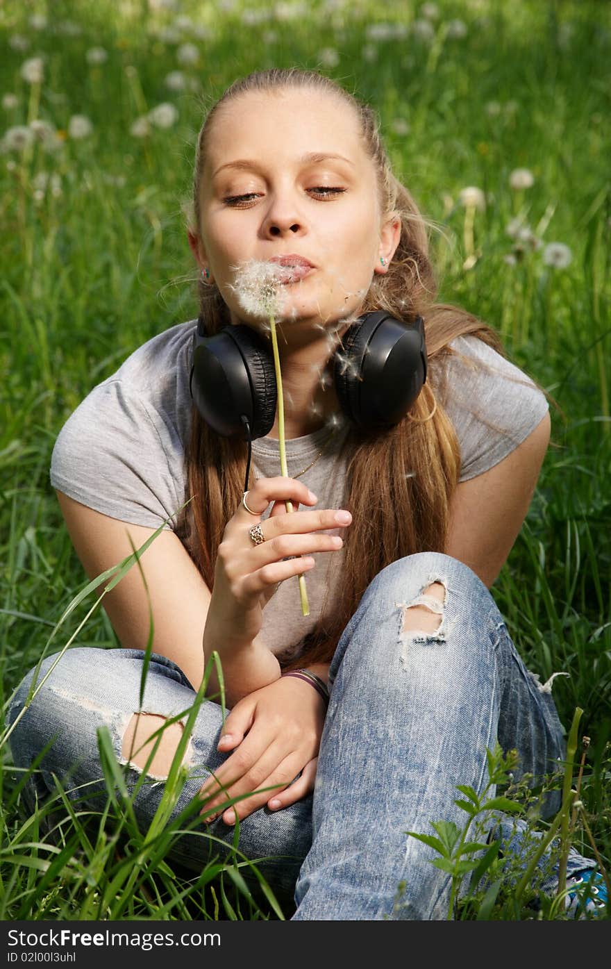 Girl listen music. outdoor shot