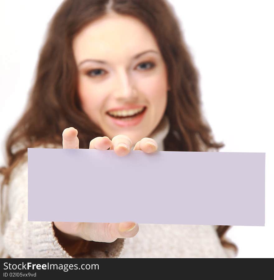 Young woman holding an empty billboard