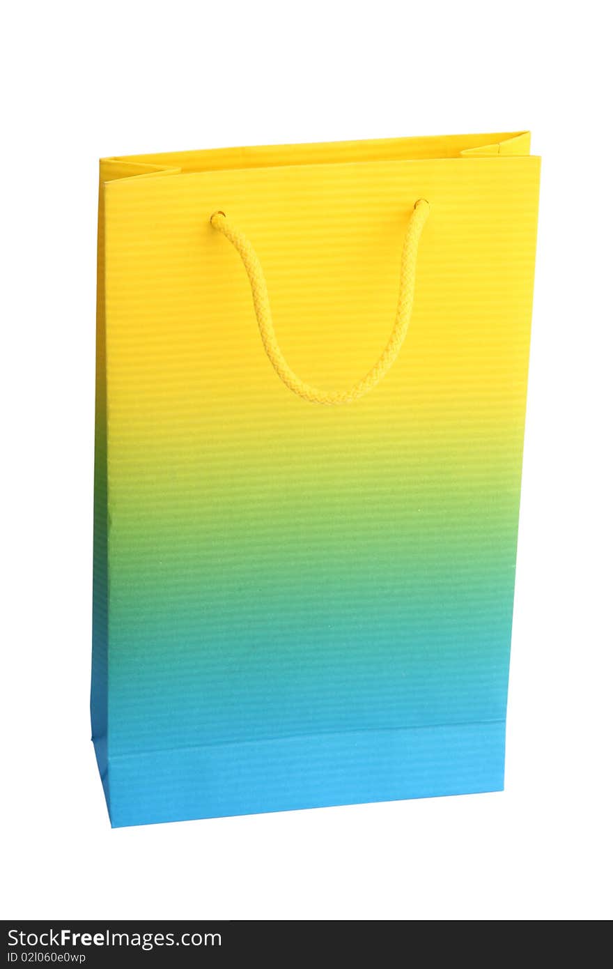 Shopping bag yellow and blue over white background. Isolated image