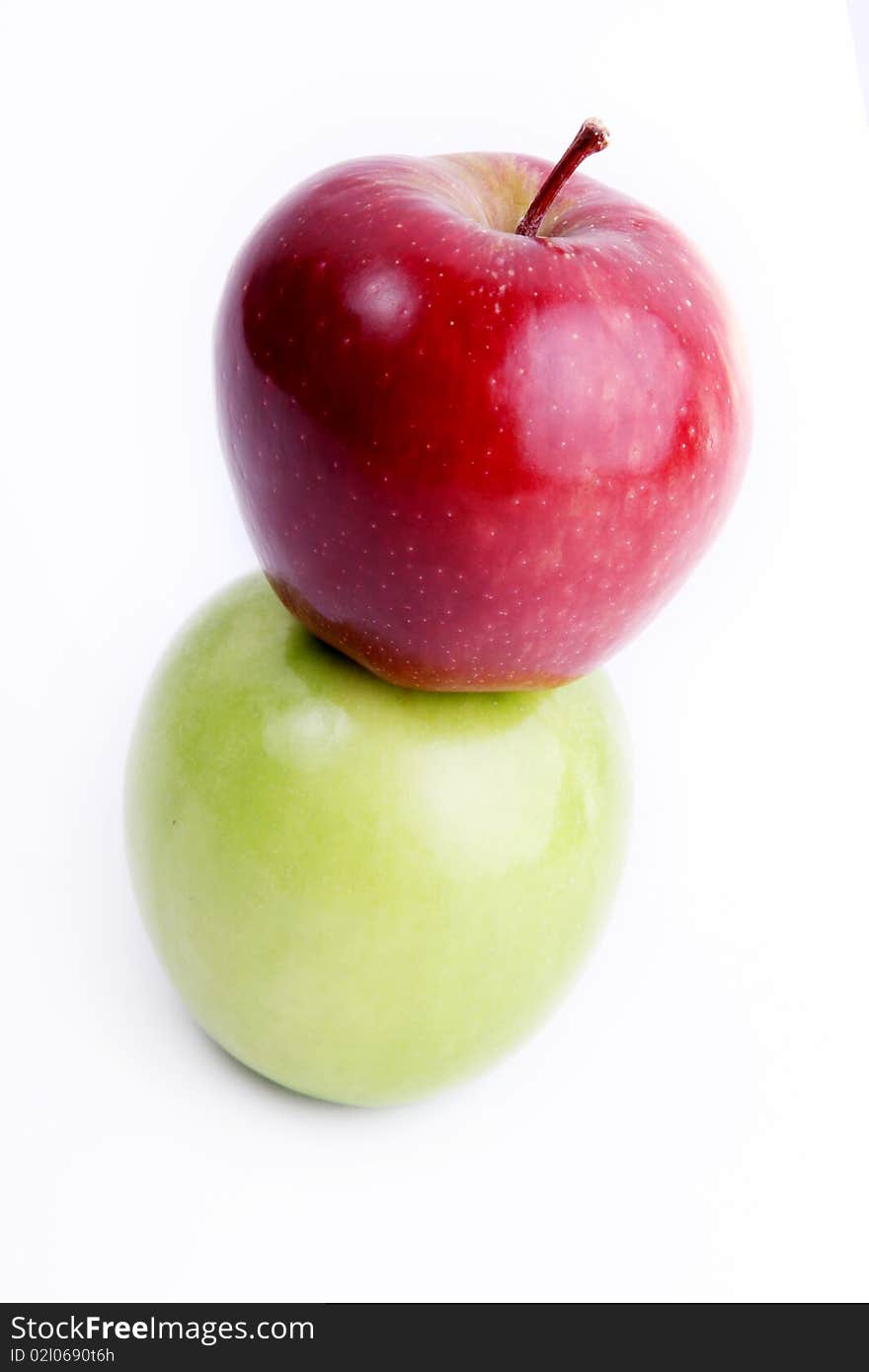 Red and green apple on white background. Concepts: nutrition, food, welfare, food. Red and green apple on white background. Concepts: nutrition, food, welfare, food