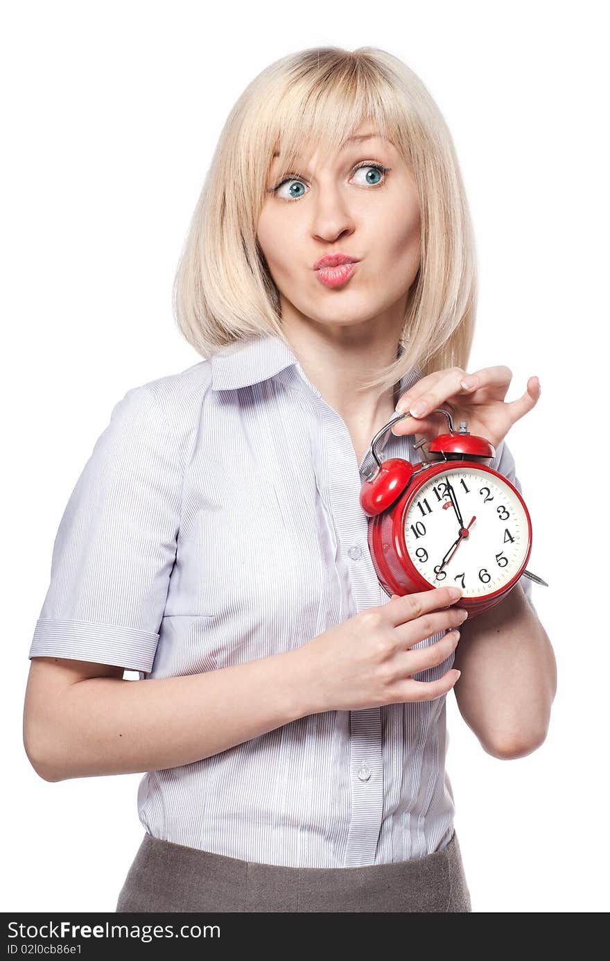 A beautiful young woman with alarm clock isolated