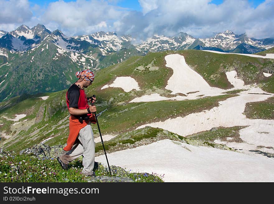 Hiker boy in Caucasus mountains