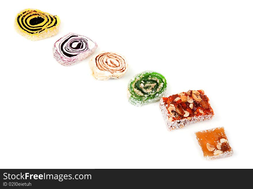 East sweetnesses, sweetmeats put on white background inline