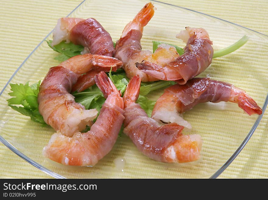 Shrimps rolled in prosciutto