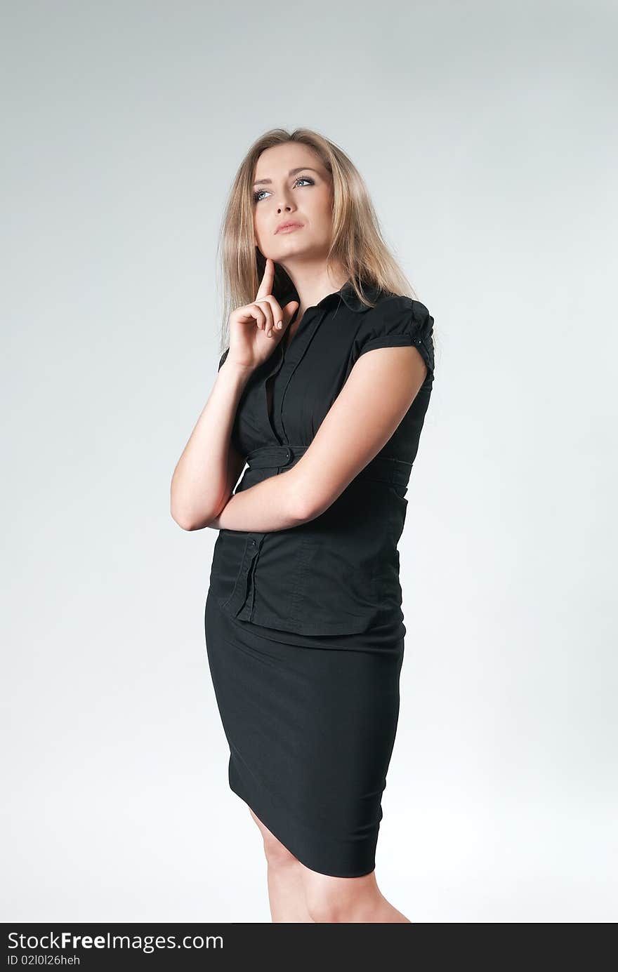 Gorgeous business ladies studio shots on uniform background. Gorgeous business ladies studio shots on uniform background