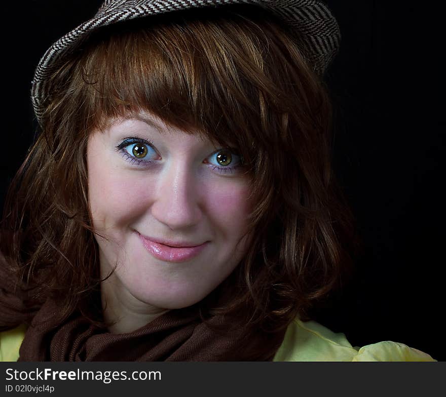 Young woman in a headdress with green eyes. Young woman in a headdress with green eyes