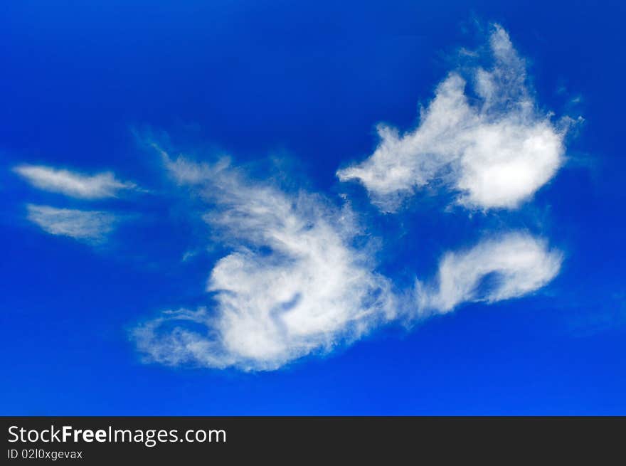 Relief picturesque clouds are in blue sky. Relief picturesque clouds are in blue sky