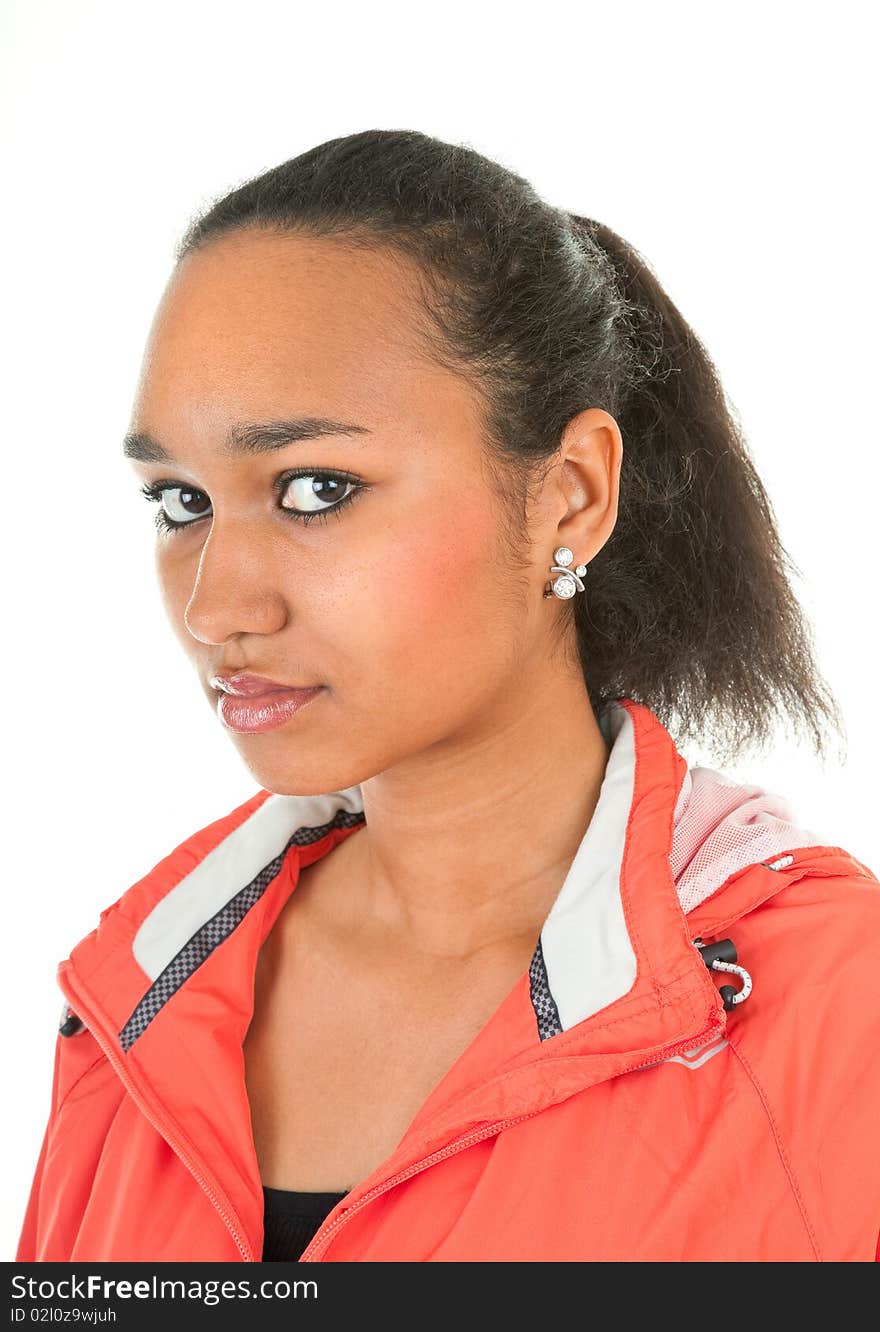 Portrait of a dark-skinned girl in a red sports clothes. Portrait of a dark-skinned girl in a red sports clothes