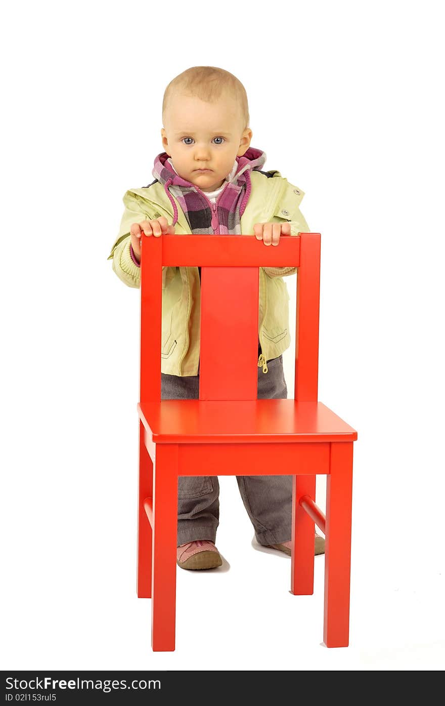 Cute Baby With A Little Red Chair