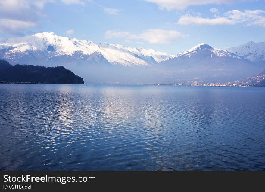 Lake with trees and grass on the banks