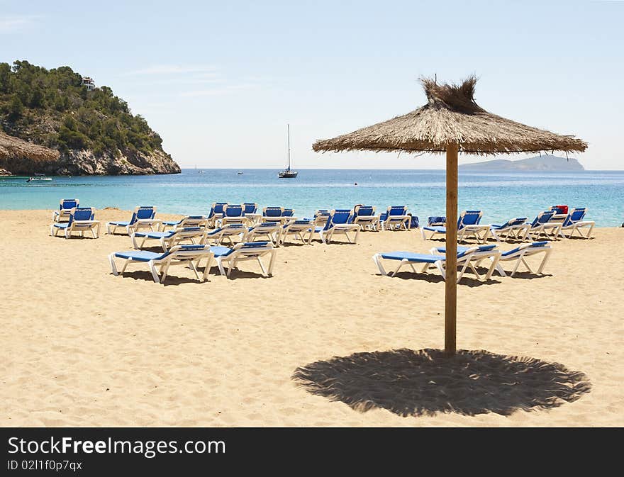 Empty Beach With Sunshade