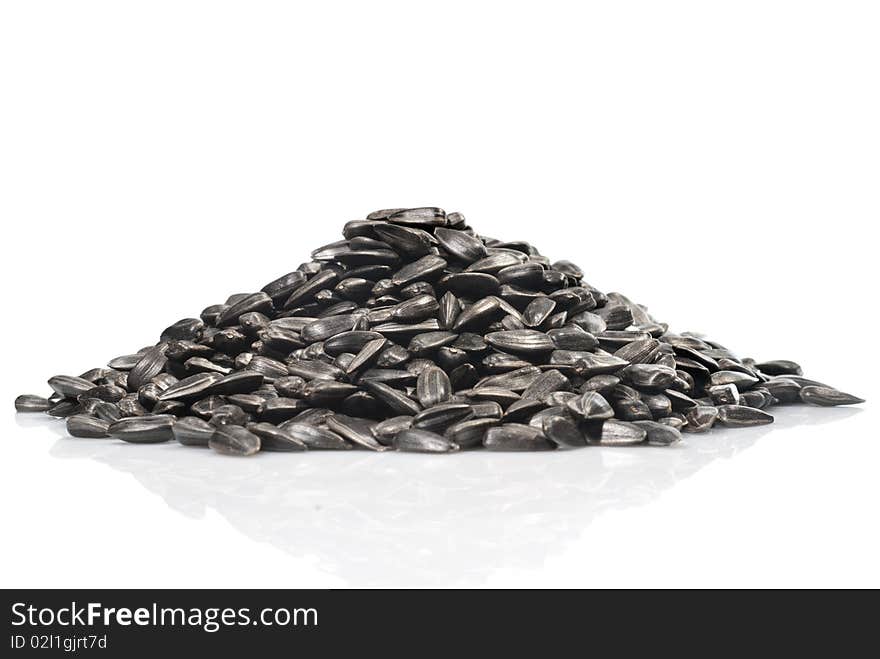 Pile of black sunflower seeds isolated