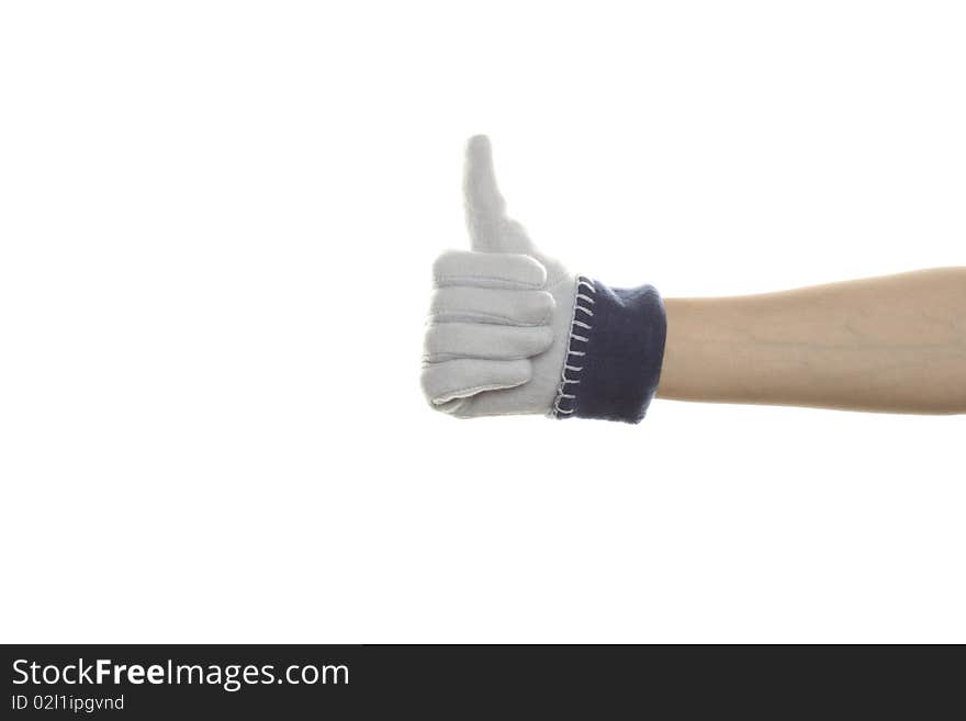 Womans hand thumbs Up. Hand in the blue warm mitten. Isolated on white background