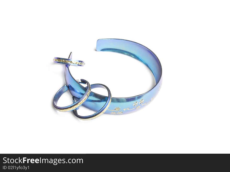 Blue bracelet, earrings and ring isolated on white background. Blue bracelet, earrings and ring isolated on white background