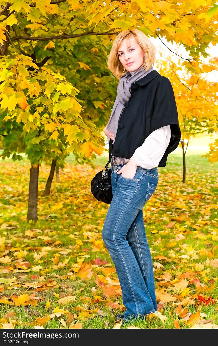 Portrait of woman in autumn forest. Portrait of woman in autumn forest