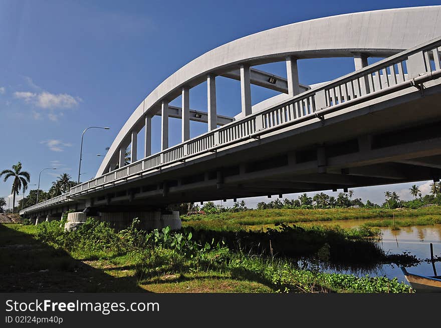 Curved bridge cross the river. Curved bridge cross the river