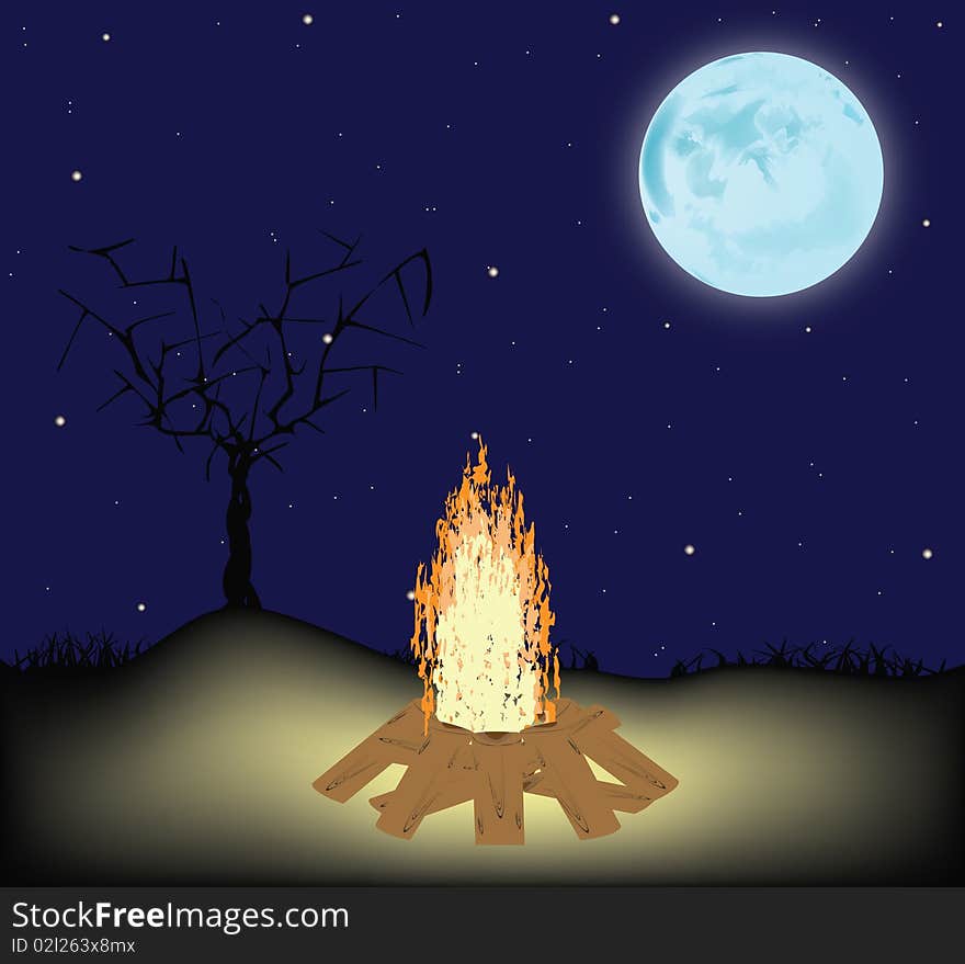 Night fire on a glade, against the night sky with the full moon