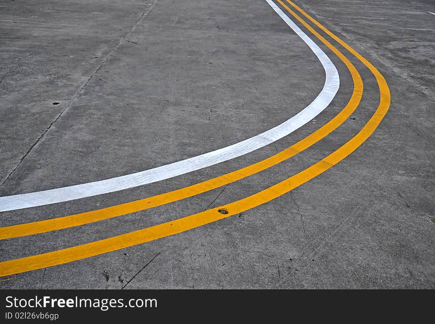 Yellow and white lines on the road