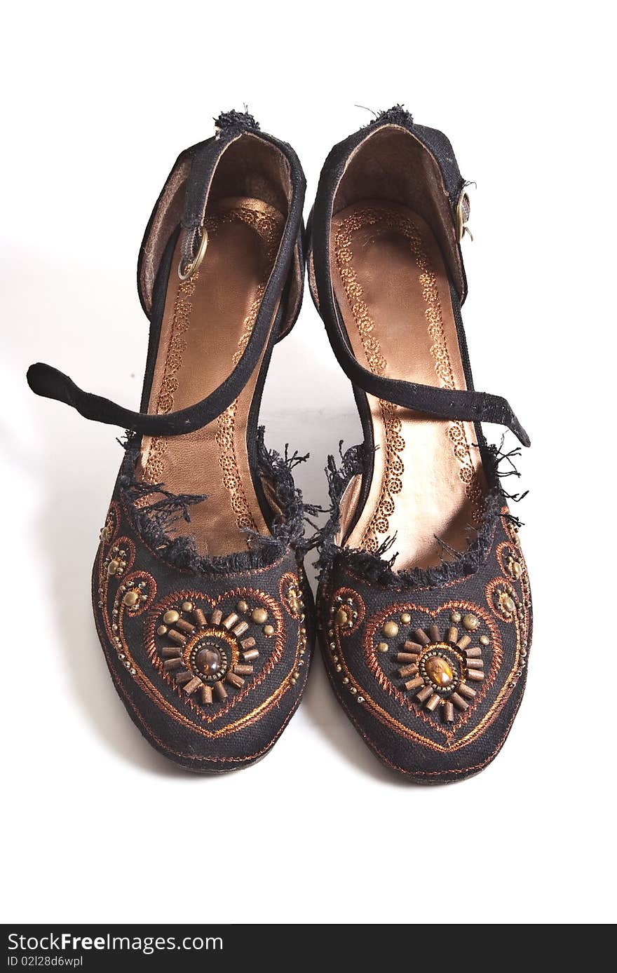 Pair of black embroided shoes