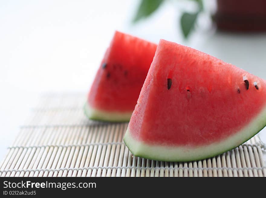 Two watermelons，Focus across the middle of image. Two watermelons，Focus across the middle of image.