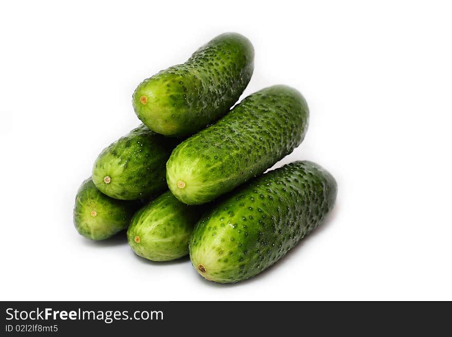 Green cucumbers isolated on white background