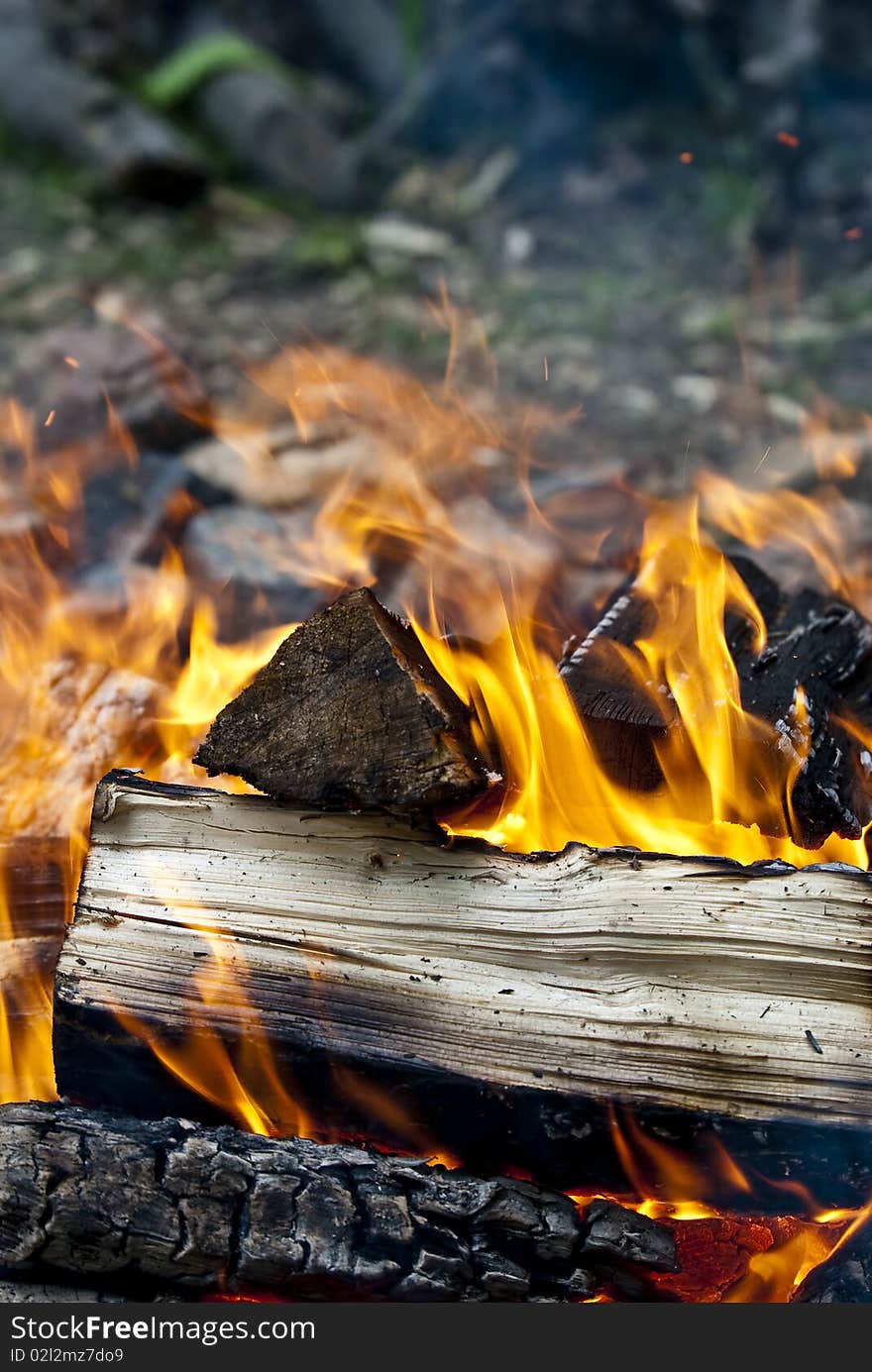 Camp fire burning in the evening