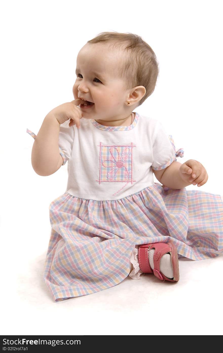 Portrait of baby girl over a white background