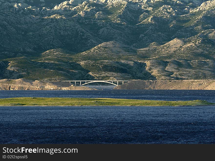 Bridge, Sea And Mountains