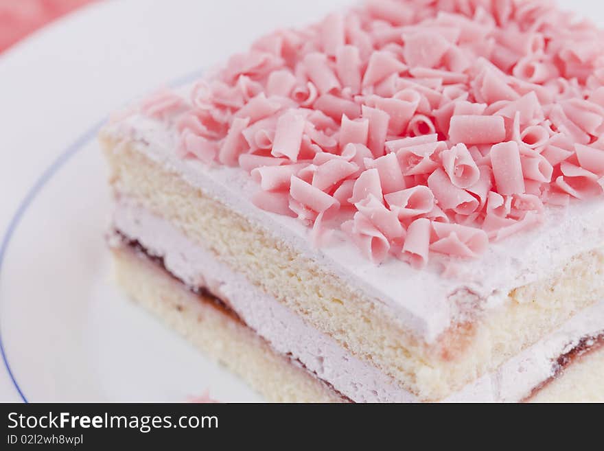 Close up of freshly made cake on white plate