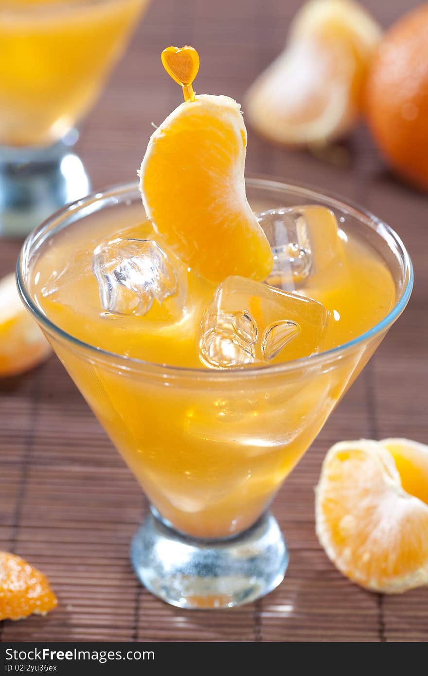 Close up of tangerine fruits on wooden table top