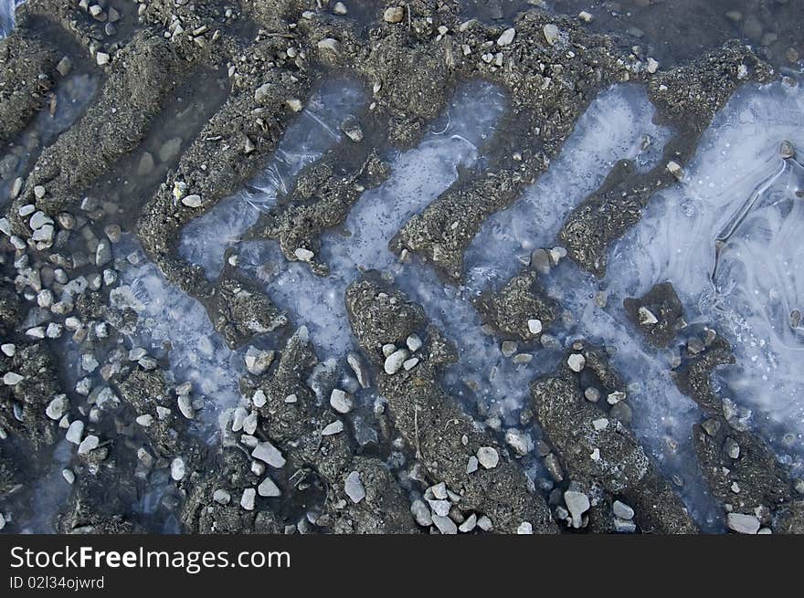 Frozen Truck Tracks In The Mud