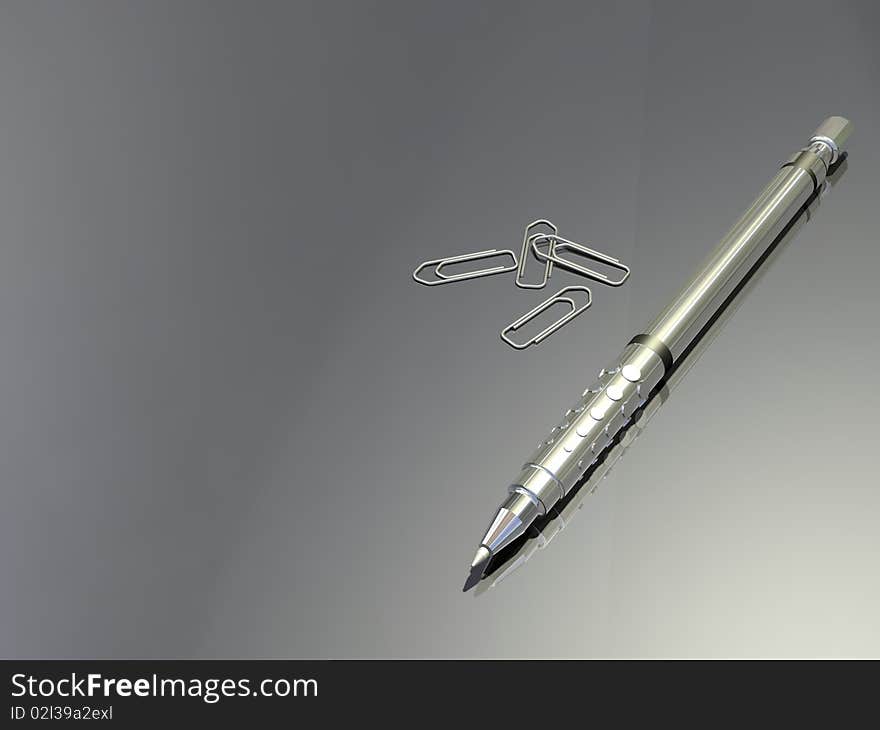 Silver pencil and paper clips on a desk