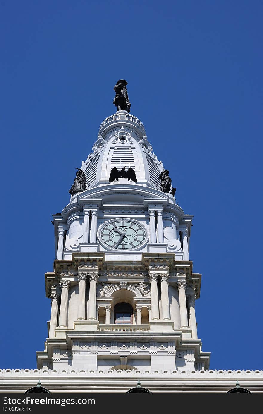 The small statue atop Philadelphia's city hall building.