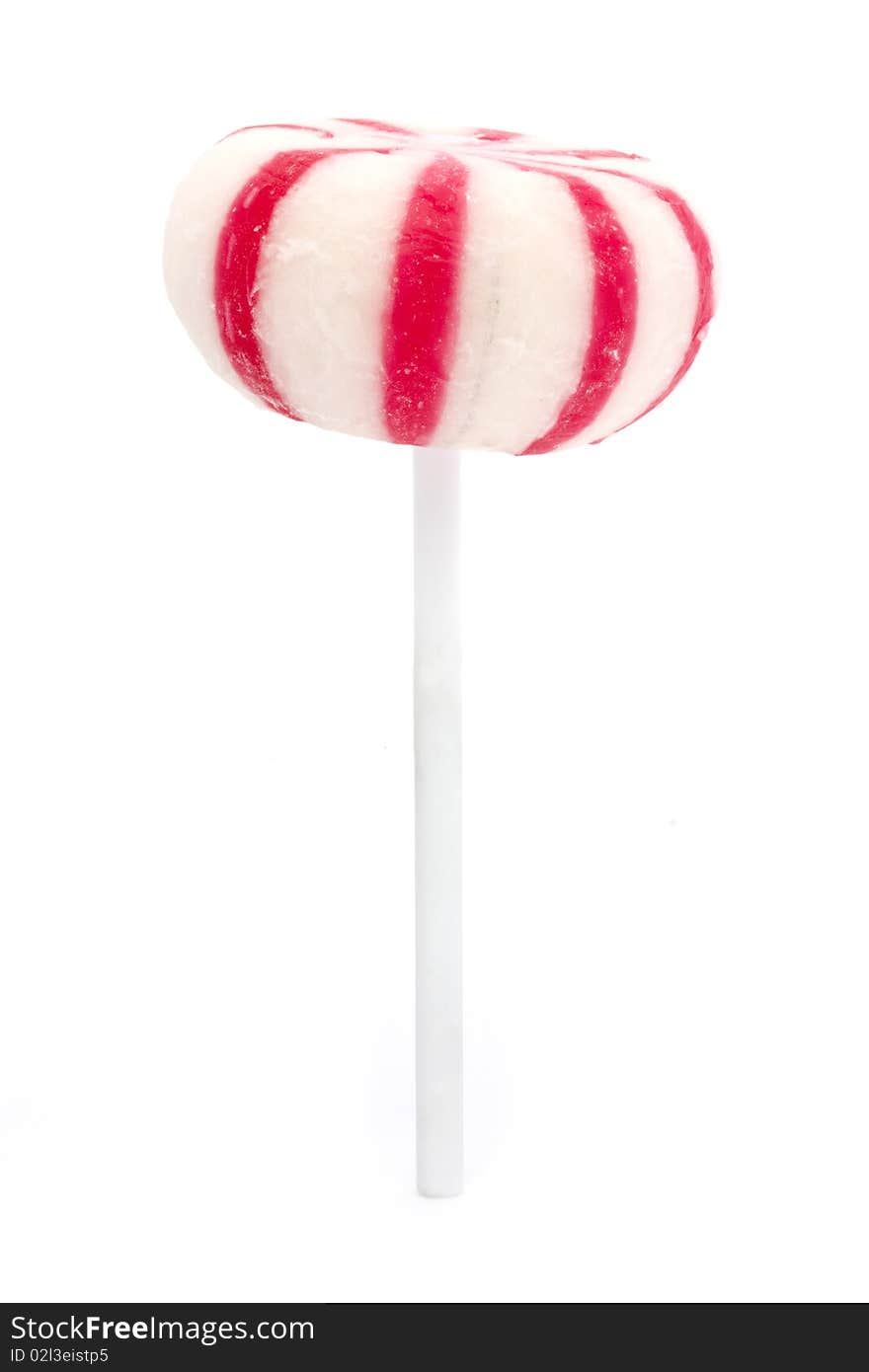 Pink and white candy lollipop isolated over white