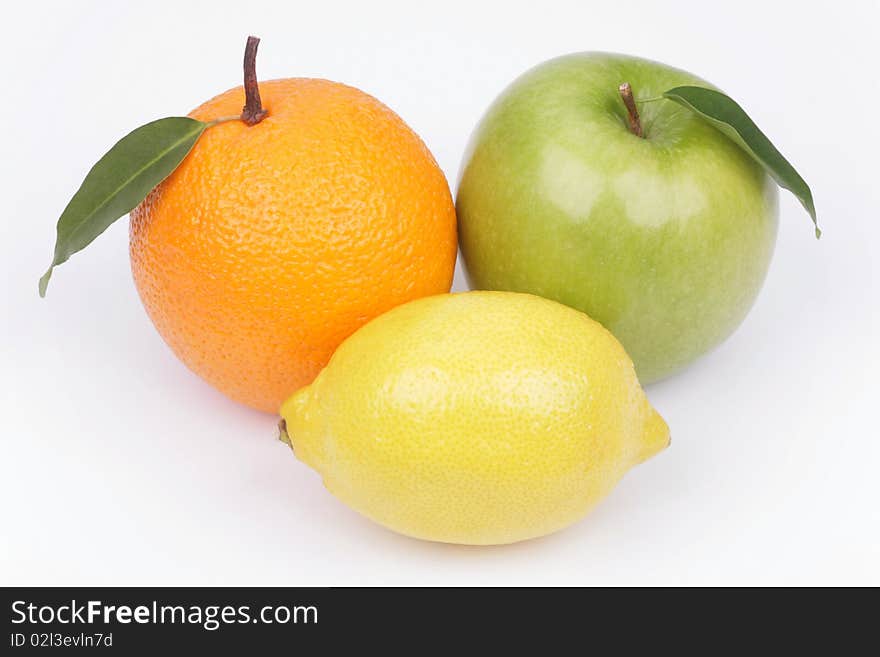 Three ripe fruit on a white background. Three ripe fruit on a white background