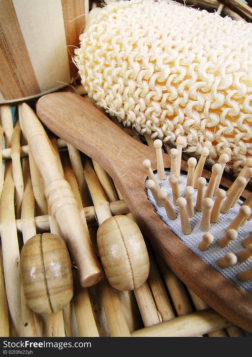 Wooden spa objects in a basket. Wooden spa objects in a basket