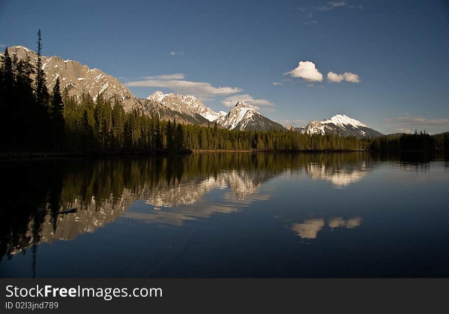 Evening reflection over Spillway Lakes, Kananaskis, Alberta, Canada. Evening reflection over Spillway Lakes, Kananaskis, Alberta, Canada