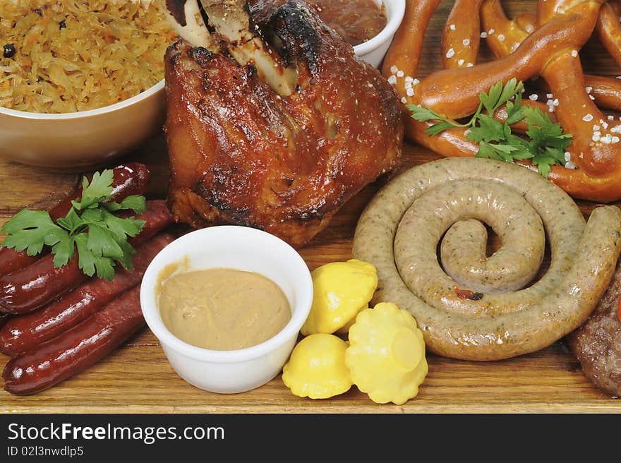 Barbecue pork, fried sausages closeup