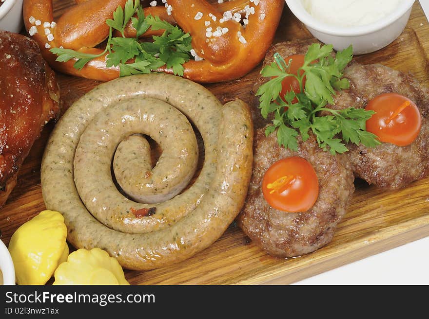 Steak Barbecue pork, fried sausages closeup