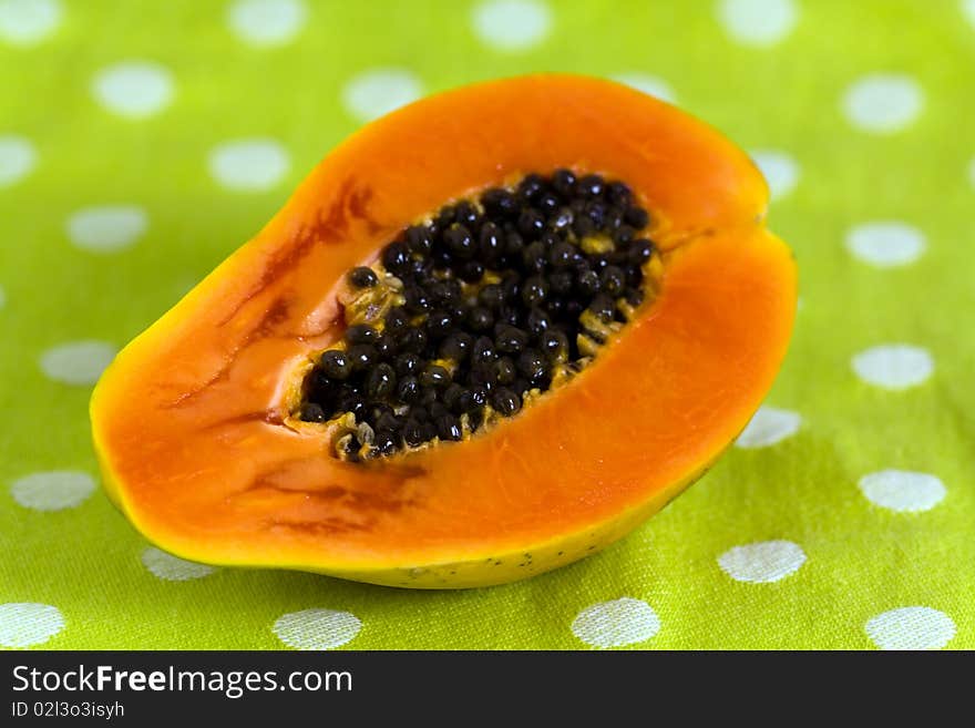 Papaya fruit on green background . Papaya fruit on green background .