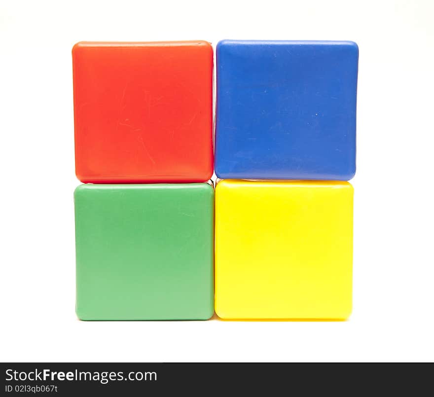 Colored childrens cubes on a white background. Colored childrens cubes on a white background