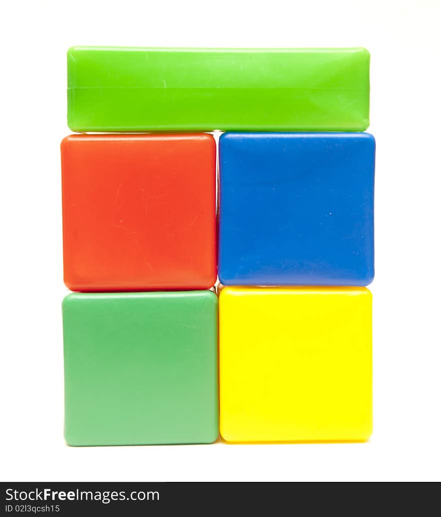 Colored childrens cubes on a white background. Colored childrens cubes on a white background