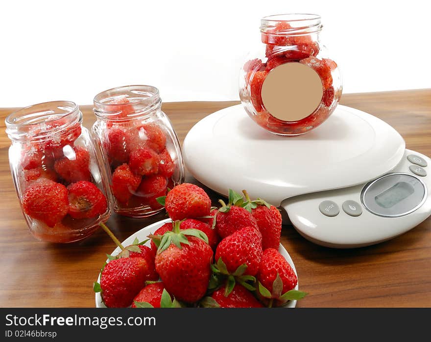 Strawberries in bowl on the scales