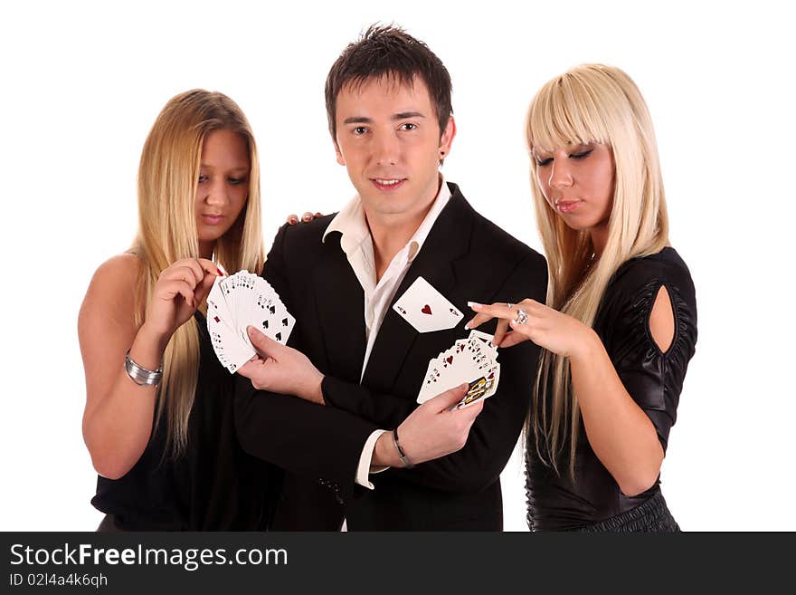 Magician make performance cards with two beauty girls