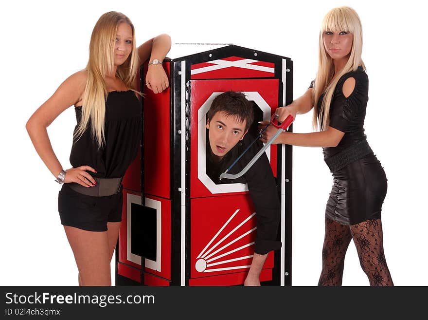 Magician and two beauty girls in a magic box